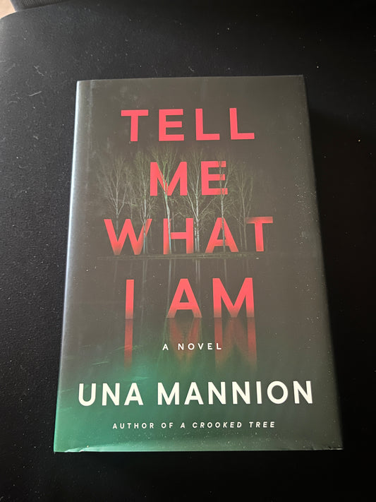 TELL ME WHAT I AM by Una Mannion
