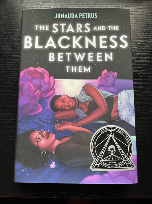 THE STARS AND THE BLACKNESS BETWEEN THEM by Junauda Petrus